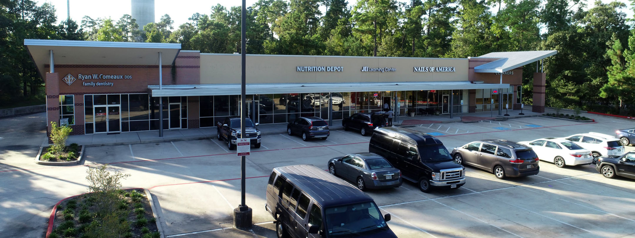 Marcel Crossing of the Woodlands Banner